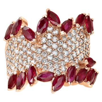 14k rose gold pave set diamond ring with pear shaped rubies