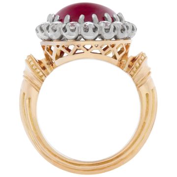 Cabochon Burma Ruby with diamond halo ring set in 18k yellow gold