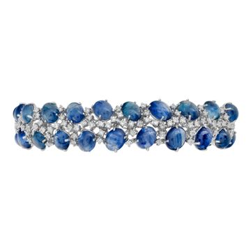 Cabochon Sapphire & diamond line bracelet in 18k white gold. Cabochon sapphire total approx. weigth: 50.00 carats