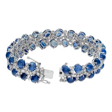 Cabochon Sapphire & diamond line bracelet in 18k white gold. Cabochon sapphire total approx. weigth: 50.00 carats