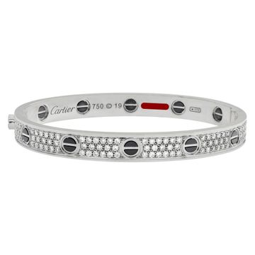 Cartier Love bracelet in 18k white gold with pave diamonds and black ceramic