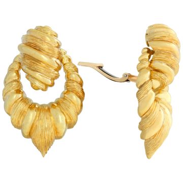 Circa 1970's, collectible Henry Dunay 18k yellow gold "Door Knocker" drop earrings.