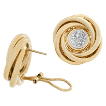 Classic Knot earrings with pave diamonds center, set in 14K yellow gold. 20mm diameter.