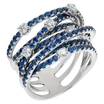 Crossover Light Blue Sapphire And Diamond Ring In 14k White Gold. Over 2 .00 Carats Blue Sapphires And Approx. 0.20 Carat Diamonds