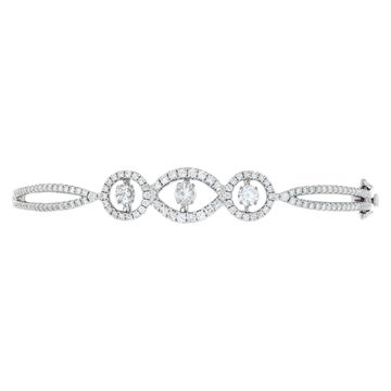 "Dancing Diamonds" bangle in 18k white gold with three circular diamonds
