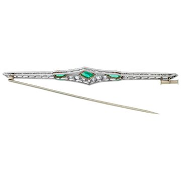 Diamonds & Emerald pin set in 18k white gold