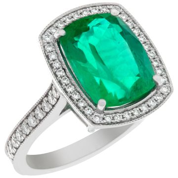 Emerald ring with diamond accents in 18k white gold