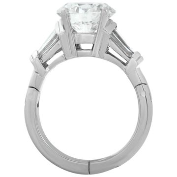 GIA Certified round brilliant cut 3.09 carat diamond, H Color, VS2 clarity set on a "FINGER MATE" platinum & 14K white gold setting with 4 tapered baguettes
