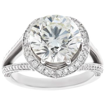 GIA certified round brilliant cut diamond 4.04 carat (M color, VS1 clarity) ring