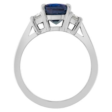 Gorgeous Sapphire and Diamonds ring set in Platinum. Central oval cut deep blue sapphire, approx total weight: 2 carats,