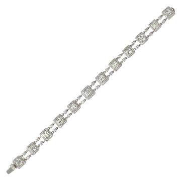Illusion baguette and round brilliant cut diamond (approx. 7.49 carat) line bracelet in 18k white gold