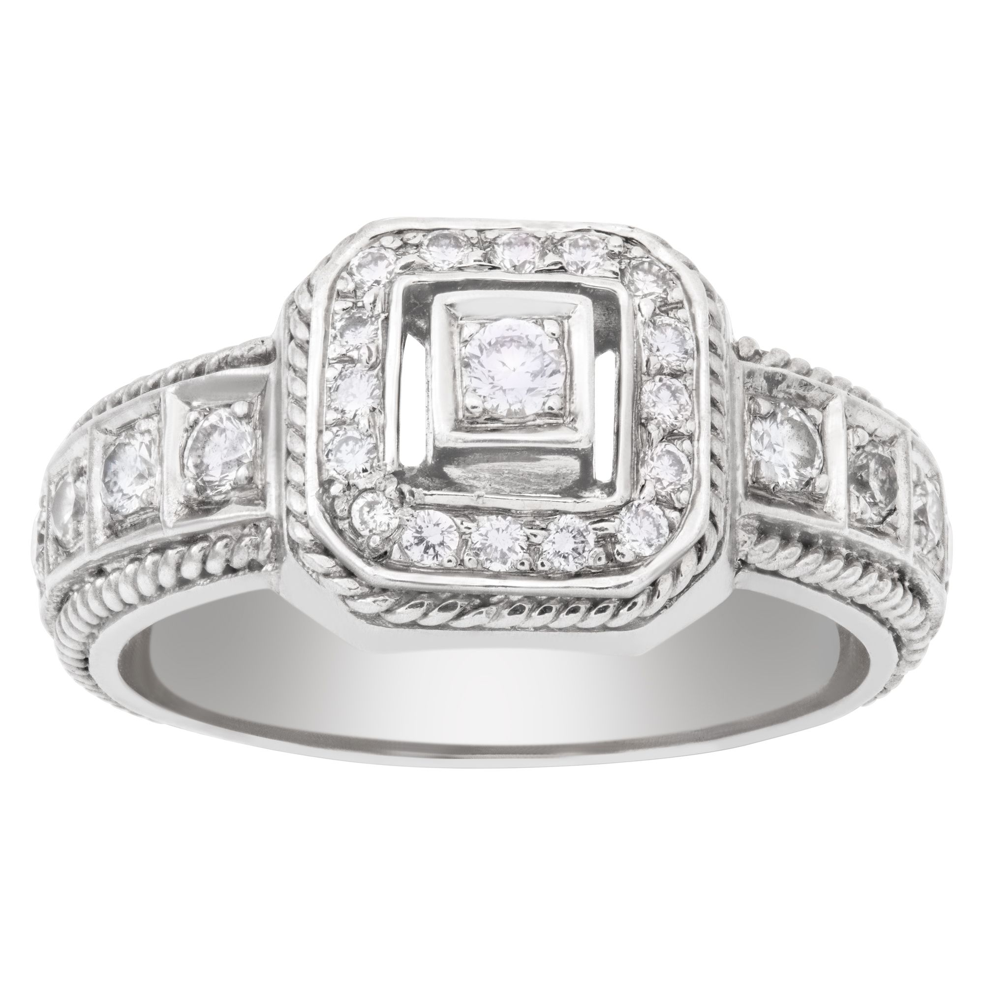 Diamond ring with approximately 0.50 carat round brilliant cut diamonds, set in platinum. Size 8.5