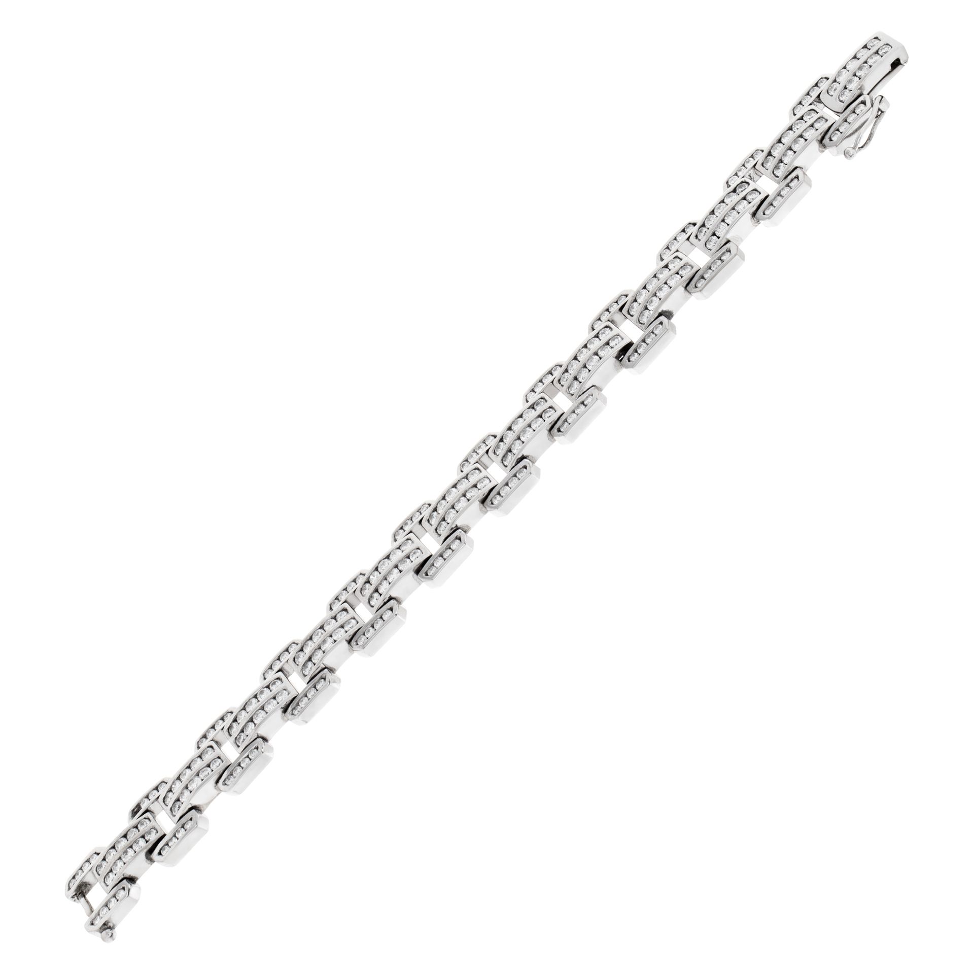 Elegant Art Deco style diamond bracelet set in 14k white gold. Approximately 8 carats channel set full cut round brilliant diamonds, estimate: G/H color- VS clarity