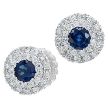 Oval brilliant cut Sapphire and Diamond earrings in 18k white gold.