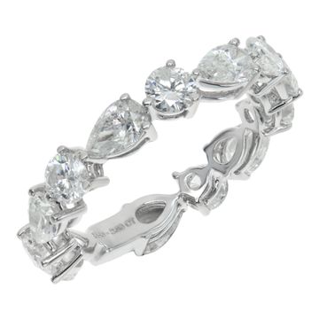 Pear and round brilliant cut diamonds eternity band in 18K white gold. Total Approx. weight: 2.86 carats.