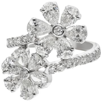 Pear & round brilliant cut diamonds flower ring in 18k white gold. 3.67 carats diamonds.