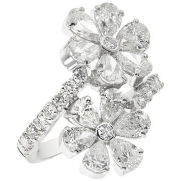 Pear & round brilliant cut diamonds flower ring in 18k white gold. 3.67 carats diamonds.