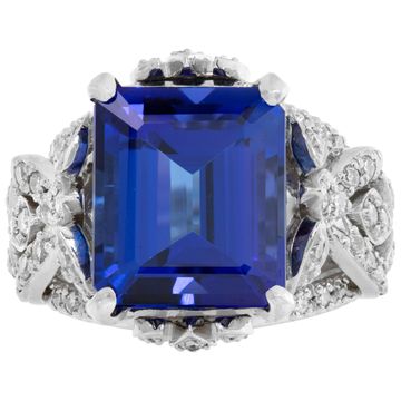 Platinum ring with center baguette cut Tanzanite and accent diamonds