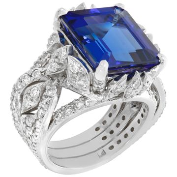 Platinum ring with center baguette cut Tanzanite and accent diamonds