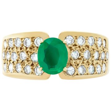 Ring with deep green oval cut emerald apprrox 0.75 carat