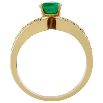 Ring with deep green oval cut emerald apprrox 0.75 carat