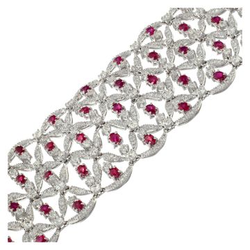 Round brilliant cut diamonds & oval brilliant cut rubies bracelet in 18k white gold. Diamonds total approx weight: 18.40 carats.