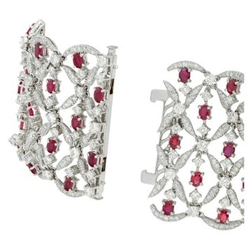 Round brilliant cut diamonds & oval brilliant cut rubies bracelet in 18k white gold. Diamonds total approx weight: 18.40 carats.
