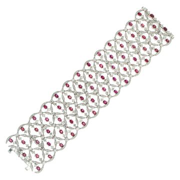 Round brilliant cut diamonds & oval brilliant cut rubies bracelet in 18k white gold. Diamonds total approx weight: 18.40 carats.