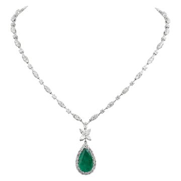 Round brilliant diamond necklace with pear shape Zambian emerald (7.11 carats) and diamond drop pendant, in 18k white gold.