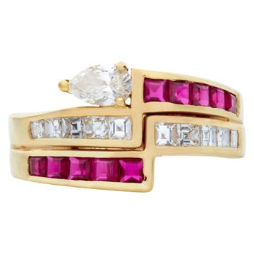 Ruby & diamond ring in 18k yellow gold with approximately 0.80 carats in pear and princess cut diamonds