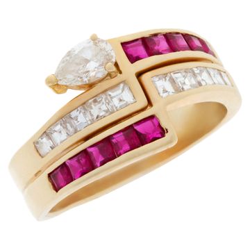 Ruby & diamond ring in 18k yellow gold with approximately 0.80 carats in pear and princess cut diamonds
