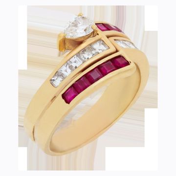 Ruby & diamond ring in 18k yellow gold with approximately 0.80 carats in pear and princess cut diamonds