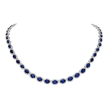 Sapphire and round brilliant diamonds line necklace in 14k white gold. Oval brilliant cut sapphires total approx. weight: 28.00 carats.