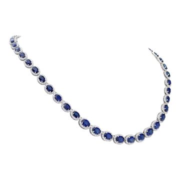 Sapphire and round brilliant diamonds line necklace in 14k white gold. Oval brilliant cut sapphires total approx. weight: 28.00 carats.