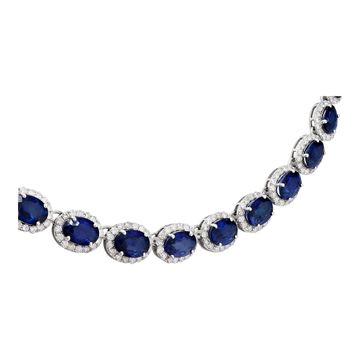 Sapphire and round brilliant diamonds line necklace in 14k white gold. Oval brilliant cut sapphires total approx. weight: 28.00 carats.