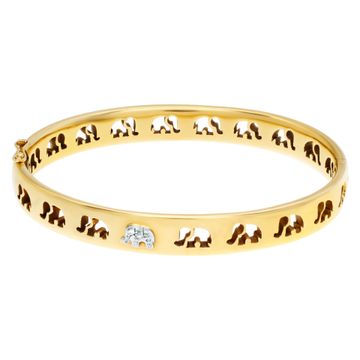 Signed "C'est Laudies" Elephant Bangle with diamond accents in 18K Yellow gold .