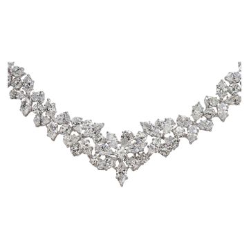 Stunning diamond necklace in 18k white gold. Floral mosaic of Marquise, Pear and Round Brilliant cut Diamonds, total approx. weight: 50.00 carats 17.00 inches long.