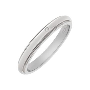 Tiffany & Co. Milgrain wedding band in platinum with single diamond accent