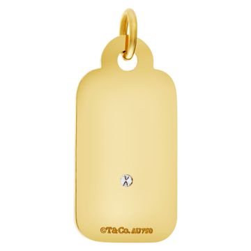 Tiffany & Co. "Yours Truly", 18Kt yellow gold Charm/Pendant with one center diamond.