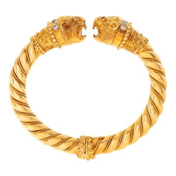 Vintage Greek designer Ilias Lalaouinis for Zolotas, original double Chimera heads design bangle bracelet  in 18K yellow gold. Bangle will fit up to 6.50 inches wrist.