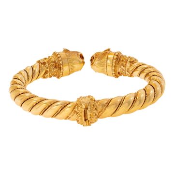 Vintage Greek designer Ilias Lalaouinis for Zolotas, original double Chimera heads design bangle bracelet  in 18K yellow gold. Bangle will fit up to 6.50 inches wrist.