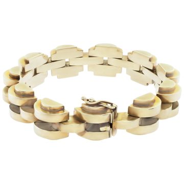 Vintage mechanical link bracelet with curved semi-circular links in 14k yellow gold.