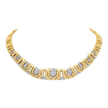 Wide diamonds chocker necklace in 18K white & yellow gold. Round diamonds total approx. weight: 2.30 carats.16 inches.