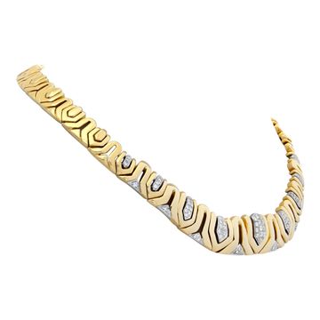 Wide diamonds chocker necklace in 18K white & yellow gold. Round diamonds total approx. weight: 2.30 carats.16 inches.